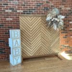 Baby Shower Setup with Wood Backdrop