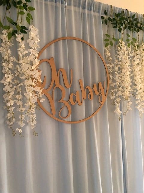 Blue Chiffon, Wisteria Flowers and Oh Baby Backdrop Hire